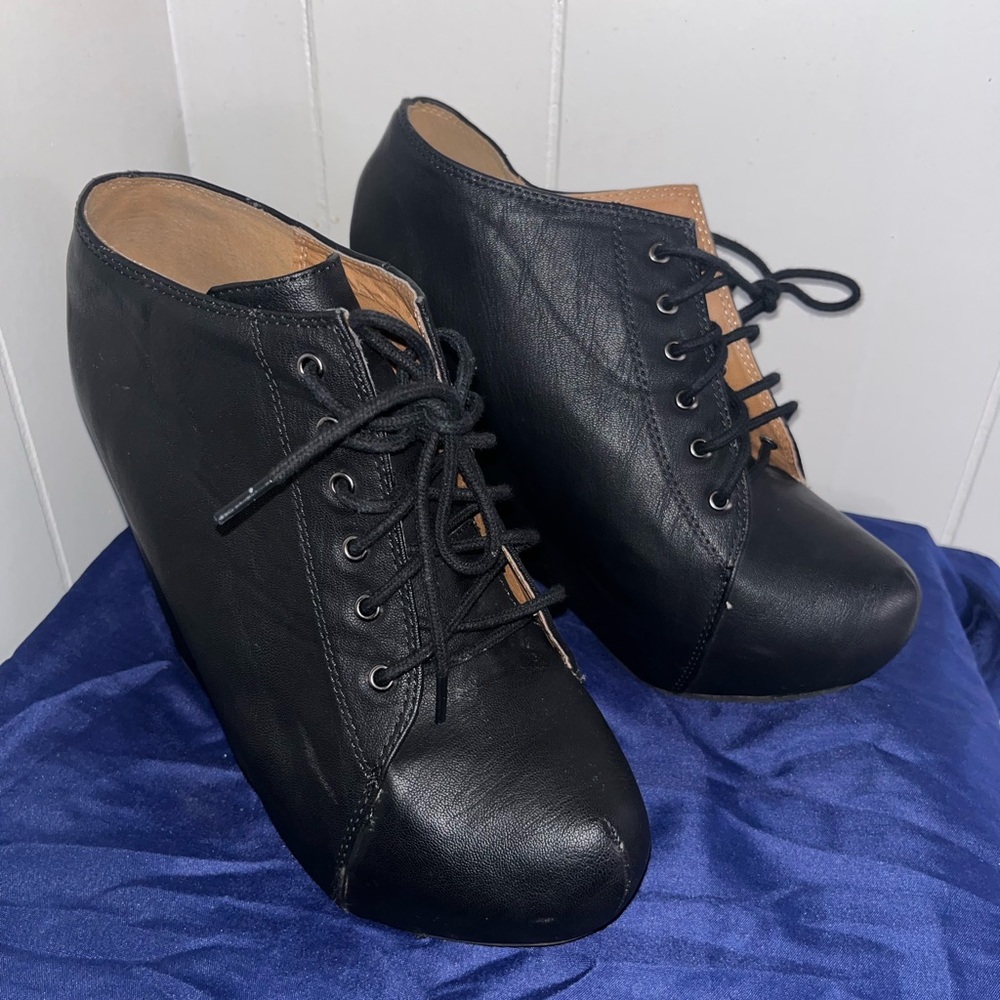 Black wedge heels.. gently used